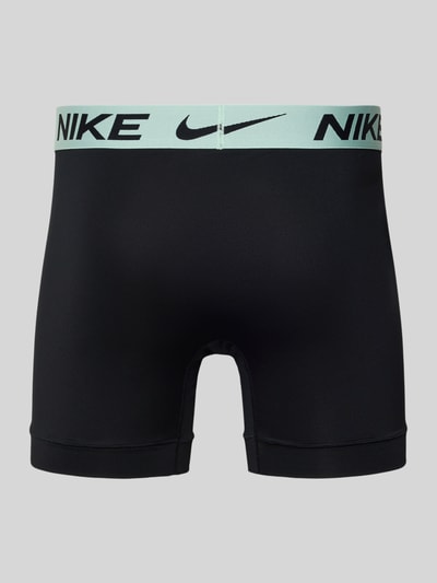 Produktfoto, Trunks mit Logo und elastischem Bund von Nike in Schwarz mit kontrastierendem Logo-Bund, körpernahe Passform, Material-Mix mit Stretch-Anteil
