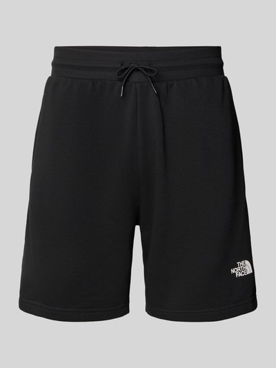 Produktfoto, Shorts mit Logo von The North Face in Schwarz, Herren Shorts aus Baumwoll-Mix, Regular-Fit, Elastischer Bund, Innenbeinlänge 18 cm, Bundweite 41 cm bei Größe M, glatte Oberfläche.