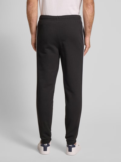 Lacoste Loose fit sweatpants van puur katoen, model 'TAPE' Zwart - 5