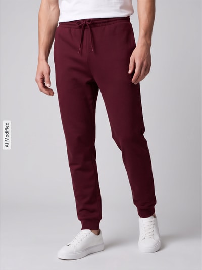adidas Sportswear Spodnie dresowe o kroju regular fit z mieszanki bawełny model 'FEELCOZY' Ciemnoczerwony 4