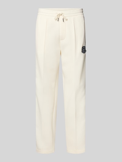 Produktfoto, Sweatpants mit Label-Patch und elastischem Bund von ARMANI EXCHANGE in Creme, Baumwoll-Mix mit Längsnähten, Relaxed Fit, Struktur glatt