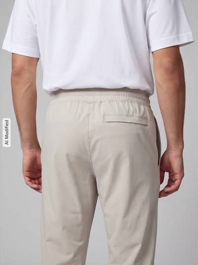 Under Armour Relaxed Fit Trainingshose mit Label-Print Khaki 3