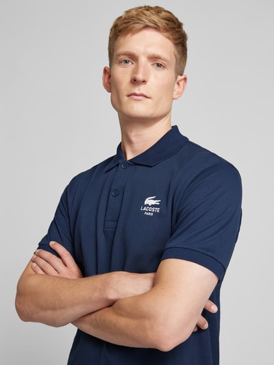 Lacoste Poloshirt met labelprint, model 'Piquet' Donkerblauw - 3