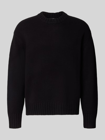 Produktfoto, Relaxed Fit Strickpullover aus reiner Wolle von Antony Morato, schwarze Farbe, unifarben, elastische Abschlüsse, Struktur fein gestrickt, Herren Strickpullover, klassische Form, Rückenlänge 67 cm, Ärmellänge 60 cm.