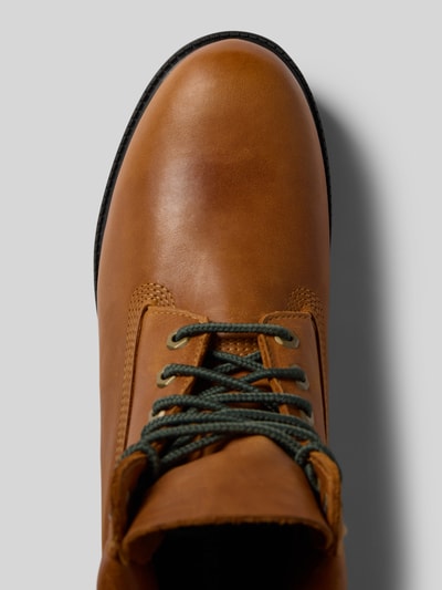 Productfoto, Schnürboots aus echtem Leder van Timberland voor heren, bruin leer, afgerond model, vetersluiting, Label in reliëf, geprofileerde zool, hakhoogte maat 44: 3 cm, schachthoogte maat 44: 15 cm, schachtbreedte maat 44: 11 cm, detailopname