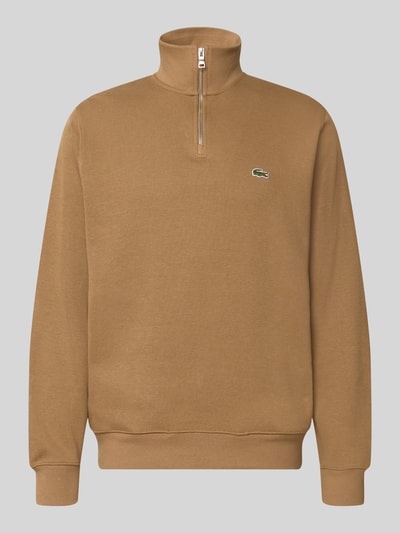 Produktfoto, Regular Fit Troyer aus reiner Baumwolle von Lacoste in hellem Braun mit Reißverschluss und Logo-Applikation, glatte Textur