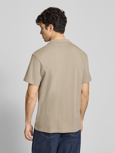 Męski model nosi Regular Fit Poloshirt mit Logo von G-Star Raw, bawełna, krój regular fit, całkowity widok z tyłu
