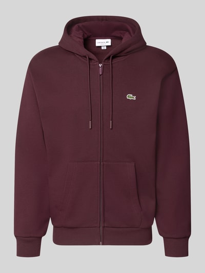 Produktfoto, bordeauxroter Classic Fit Sweatjacke aus katoenmix van Lacoste Heren Sweatjacke mit Kängurutasche vor grauem Hintergrund