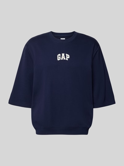 Produktfoto, T-shirt met ronde hals en logoprint van GAP, katoenmix, loose fit, ribboorden, ruglengte maat M 70 cm, donkerblauw