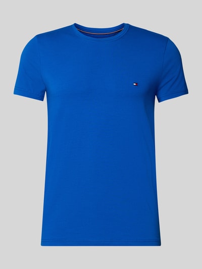 Produktfoto, Slim Fit T-Shirt aus Baumwoll-Mix von Tommy Hilfiger in kräftigem Blau, unifarben, Logo-Detail, kurzarm, Stretch-Material.