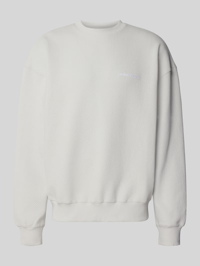 Produktfoto, wit oversized fit heren sweatshirt van Pegador, katoenmix met structuurpatroon en gestikt logo, model 'Tate'