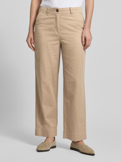 Vrouwenmodel draagt Tapered Chino uit katoen-lyocell-linnen-mix van Marc O'Polo, unikleuren twill, mid waist, ankle-lengte, vooraanzicht volledige lichaamsopname.