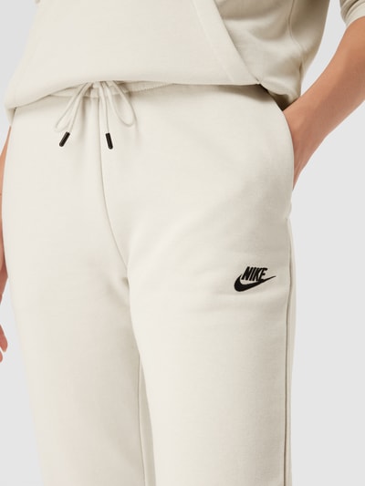 Nike Spodnie dresowe z wyhaftowanym logo Piaskowy 3