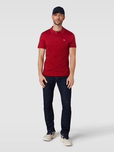 Lacoste Koszulka polo o kroju regular fit w jednolitym kolorze Czerwony 1