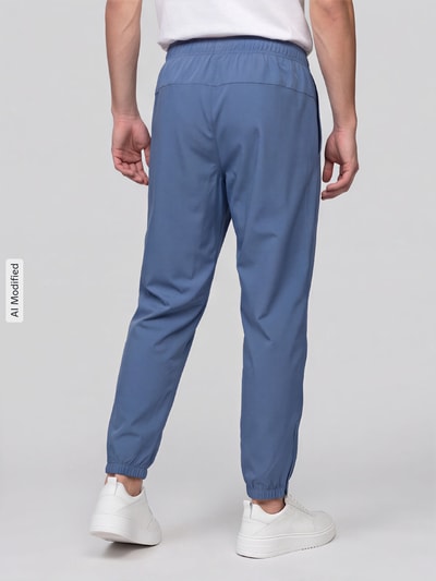 Nike Training Spodnie dresowe o kroju regular fit z nadruk z logo model 'FORM' Niebieski 5