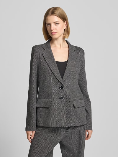 Frauenmodel trägt Regular Fit Blazer mit Pattentaschen von Emporio Armani im Allover-Look, Baumwoll-Mix, Reverskragen, Knopfverschluss, Nahaufnahme Oberkörper.