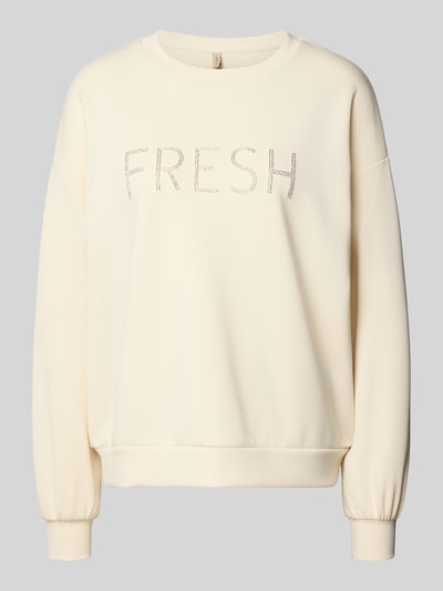 Produktfoto, Regular Fit Sweatshirt mit Ziersteinbesatz Modell 'Banu' von Soyaconcept, kremowy kolor, okrągły dekolt, elastyczne wykończenia, elastyczna mieszanka materiałów z modalu