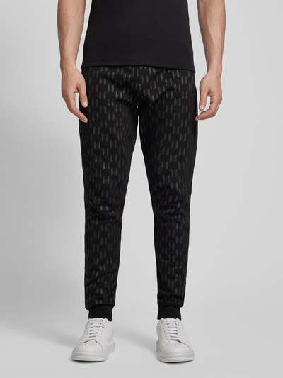 Karl Lagerfeld Spodnie dresowe o kroju regular fit z nadrukiem z logo na całej powierzchni Czarny 4