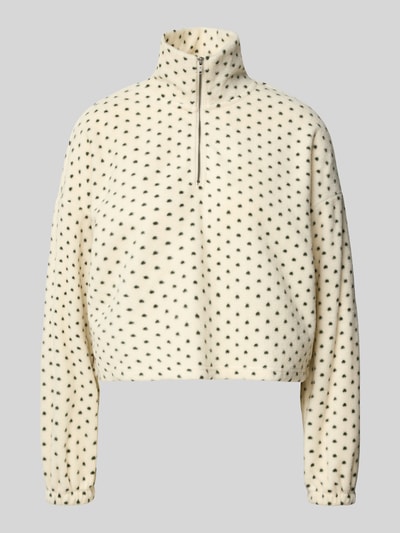 Produktfoto, cremefarbener Fleecepullover mit schwarzen Punkten, Stehkragen und Reißverschluss, Modell 'FLECI' von NOISY MAY®, Regular Fit, Allover-Look