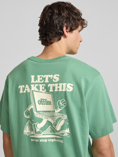 Männermodel trägt T-Shirt mit Rundhalsausschnitt von The North Face, puur katoen, regular fit, 1/2-mouwen, labeldetail, ruglengte maat M 71 cm, rugaanzicht