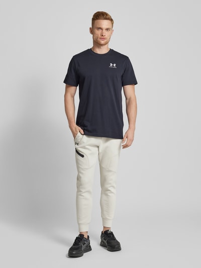 Under Armour Regular fit sweatpants met ritszak, model 'UNSTOPPABLE' Offwhite - 1