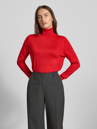 Frauenmodel trägt Strickpullover mit gerippten Abschlüssen von Christian Berg Woman, Viskose-Mix, Slim Fit, Rollkragen, Nahaufnahme Oberkörper.