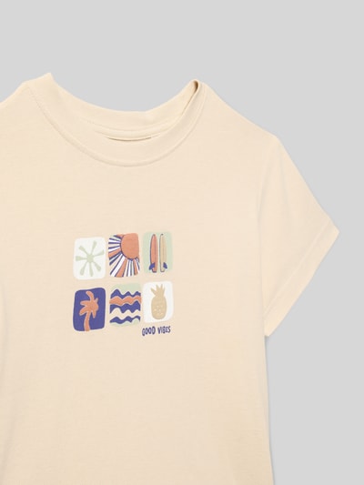 Produktfoto, Regular Fit T-Shirt mit Motiv-Print von Blue Seven, Kinder T-Shirt aus Reine Baumwolle, Rundhalsausschnitt, Rückenlänge bei Größe 116: 42 cm, beigefarbene Oberfläche mit farbigem Print, glatte Textur
