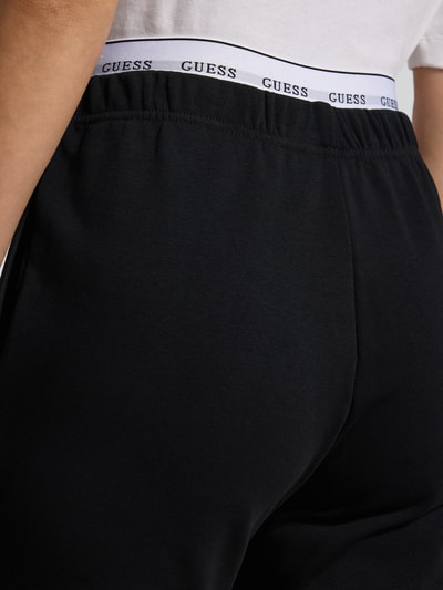 Guess Spodnie dresowe o kroju regular fit z paskiem z logo model ‘SOFIA’ Czarny 3