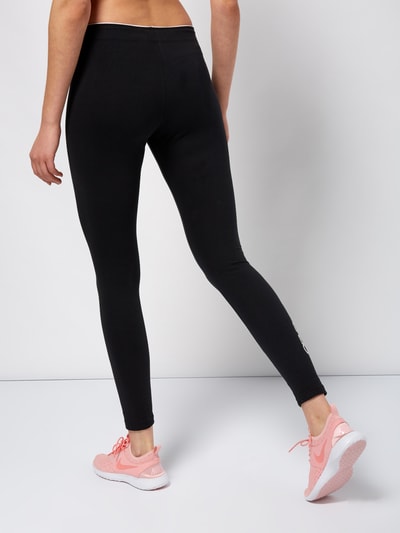 Kup online Nike Legginsy w jednolitym kolorze z detalem z logo