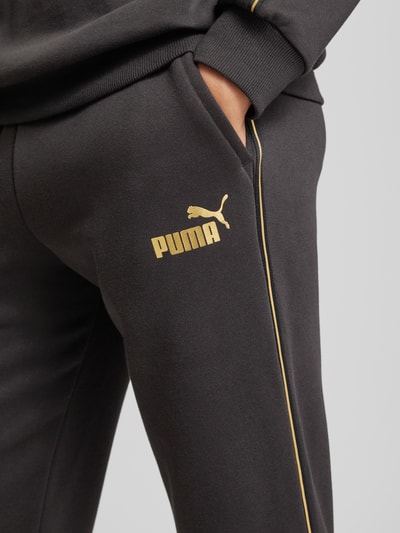 PUMA PERFORMANCE Spodnie dresowe o kroju tapered fit z nadrukiem z logo Czarny 3