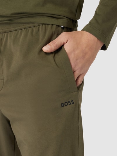 BOSS Spodnie dresowe o kroju regular fit z elastycznym pasem i tunelem Oliwkowy 3