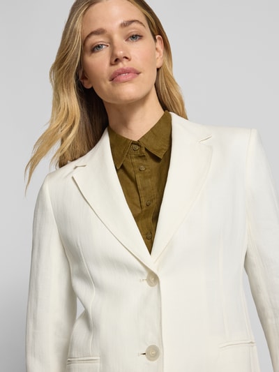 Vrouwenmodel draagt Regular Fit Longblazer uit puur linnen model 'BELLO' van Max Mara, look: effen, reverskraag, rugsplit, 2-knoopsluiting, lange mouw, paspelzakken, materiaal: linnen, nahaufnahme bovenlichaam.