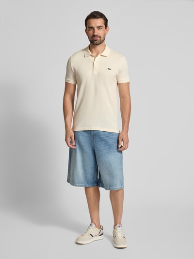 Lacoste Slim Fit Poloshirt aus reiner Baumwolle Offwhite 1