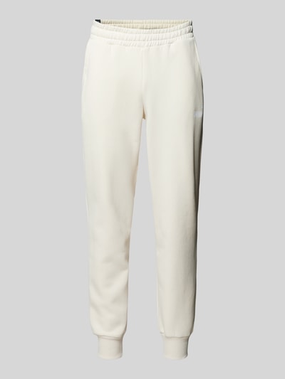 PUMA PERFORMANCE Relaxed Fit Sweatpants mit Label-Print Offwhite 2