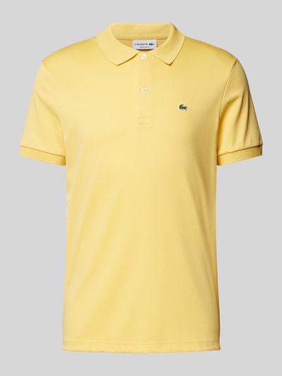 Lacoste Koszulka polo o kroju regular fit w jednolitym kolorze Jasnożółty 2