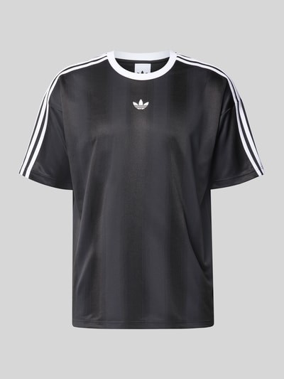 Produktfoto, Funktionsshirt mit Logo und Rundhalsausschnitt von adidas Originals in Schwarz mit weißen Kontraststreifen, Regular Fit, glatte Textur