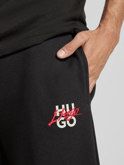 HUGO Loose fit sweatpants met tunnelkoord, model 'Dlogopante' Zwart - 3