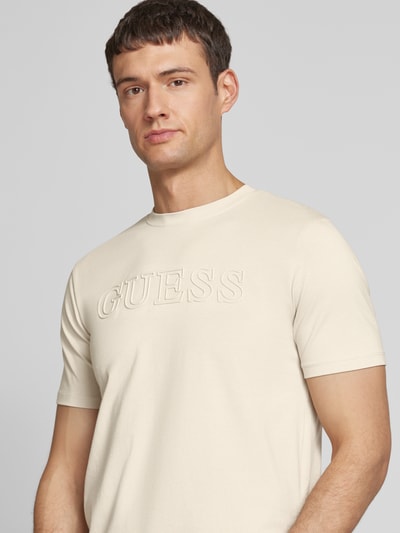 Guess Activewear T-Shirt mit Label-Print Modell 'ALPHY' Beige 3