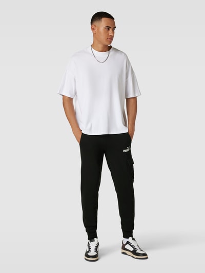 PUMA PERFORMANCE Sweatpants mit Cargotasche Black 1