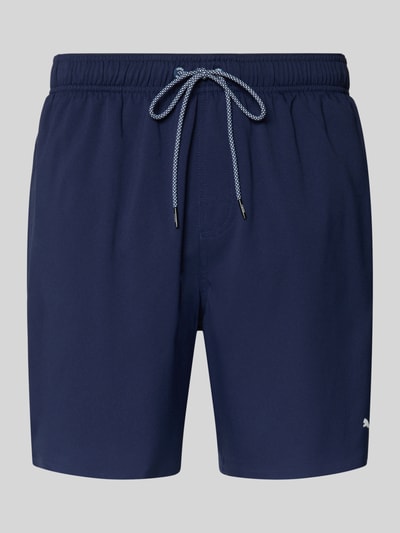 Produktfoto, Badeshorts mit Seitentaschen und Reißverschlusstasche hinten von PUMA in Dunkelblau, Regular-Fit, elastischer Bund, glatte Oberfläche