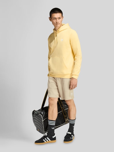 adidas Originals Hoodie aus Baumwoll-Mix mit Label Stitching Hellgelb 1