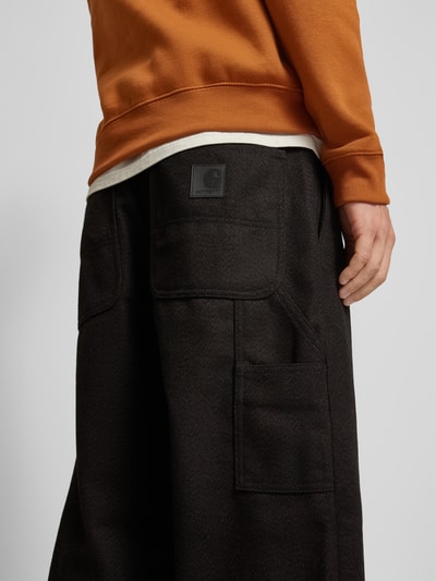 Carhartt Work In Progress Spodnie materiałowe z wpuszczanymi kieszeniami w stylu francuskim model ‘TRUMAN’ Ciemnobrązowy 3