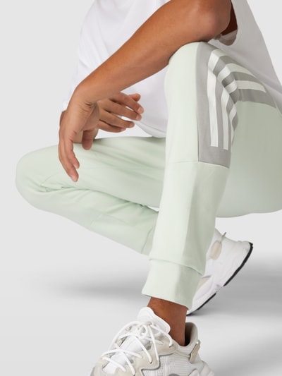 ADIDAS SPORTSWEAR Sweatpants mit Reißverschlusstaschen Modell 'M FI 3S Pant' Mint 3