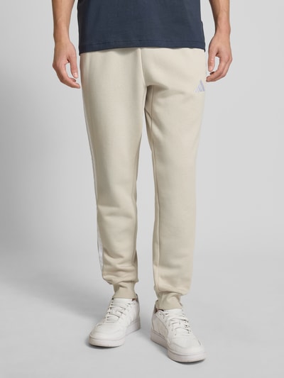 adidas Sportswear Sweatpants met labelstitching en elastische band Zand - 4
