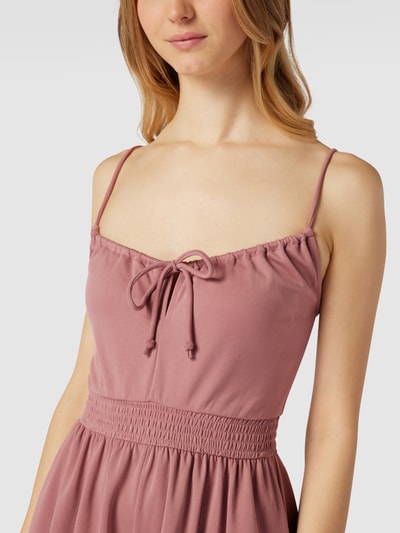 Review Playsuit mit Smok-Details Mauve 3