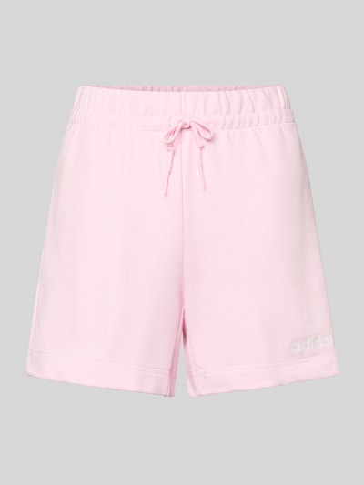 Productfoto, Shorts met elastische tailleband en trekkoord van adidas Sportswear in lichtroze, katoenmengsel met viscose, regular fit.
