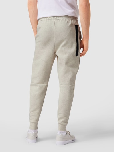 Nike Slim fit sweatpants met labelprint Offwhite gemêleerd - 5