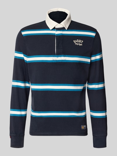 Produktfoto, Poloshirt aus reiner Baumwolle von Superdry, navy mit weißen und blauen Streifen, gerader Schnitt, Label-Stitching, elastische Abschlüsse.