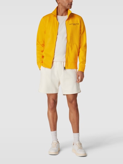 Tommy Hilfiger Sweatjacke mit Label-Stitching Modell 'TOMMY LOGO ZIP THRU STAND' GELB 1