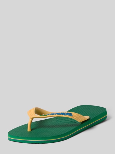 Productfoto, Zehentrenner met labeldetail van Havaianas voor dames, afgeronde punt, comfortmodel, platte zool, hakhoogte maat 39/40: 1 cm, groen en geel met fijne structuur